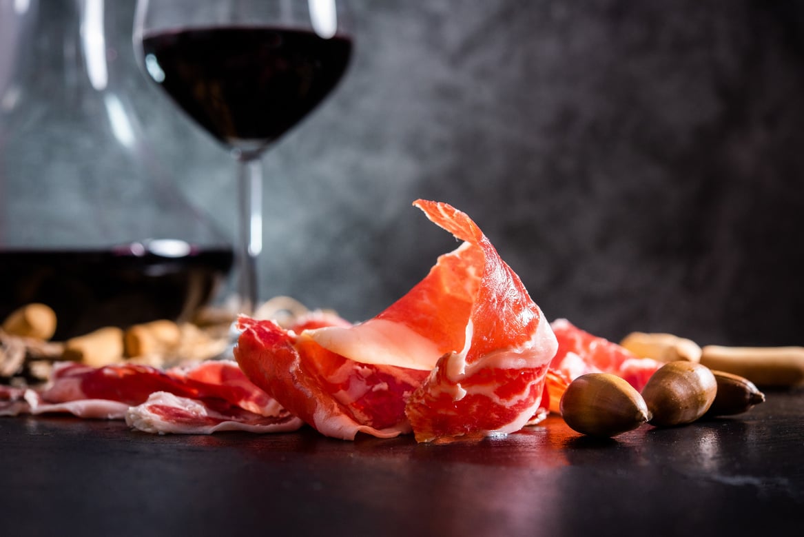 Iberian Ham. acorn-fed Iberian ham. Iberian ham with a glass of wine